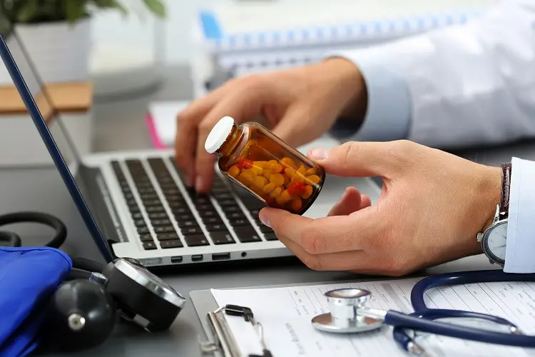 Physician Prescribing Medication