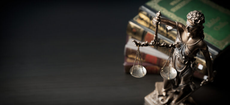 lady justice statue holding a scale