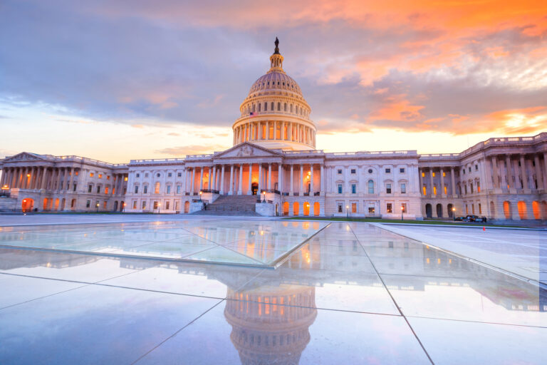 US Capitol and reflecting pool at sunset