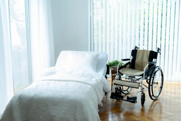 Hospital bed in home with wheelchair