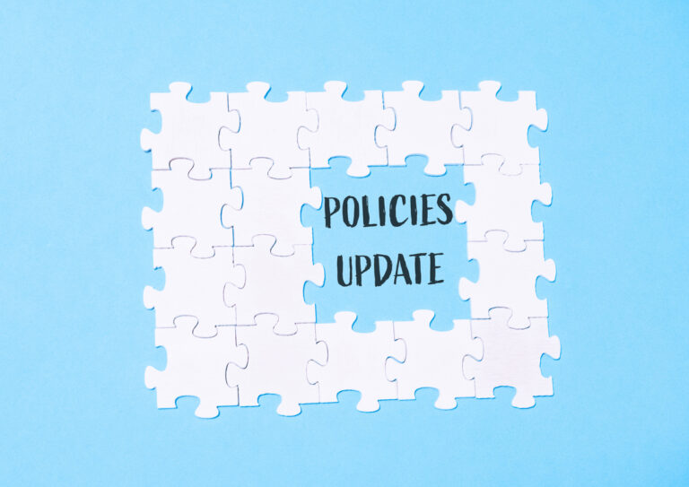 A puzzle with the word policies update in the middle