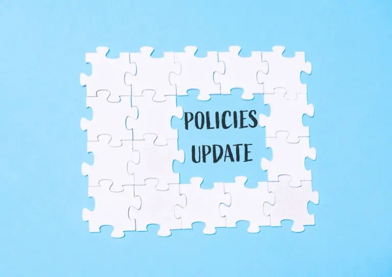 A puzzle with the word policies update in the middle