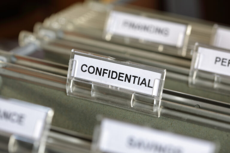 Folder with tab that says confidential