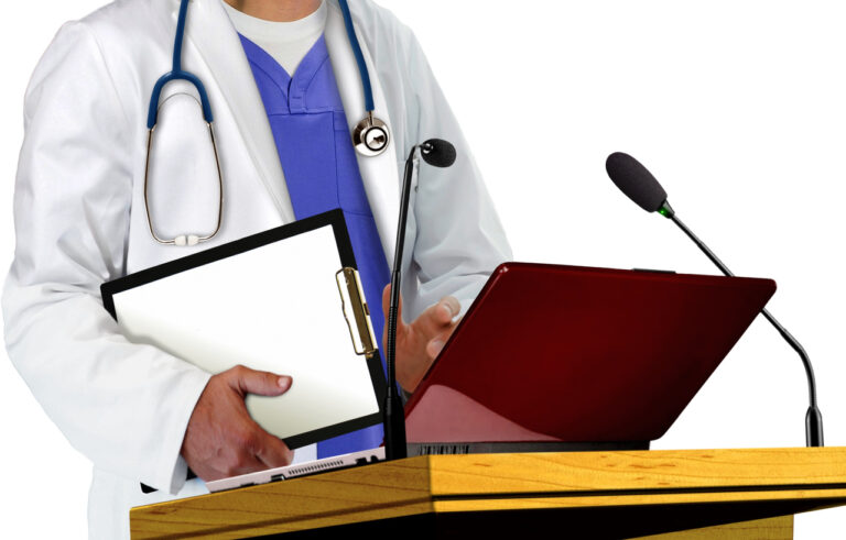 Doctor standing at podium