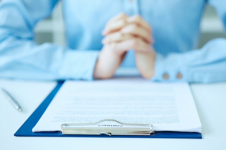 Contract on table