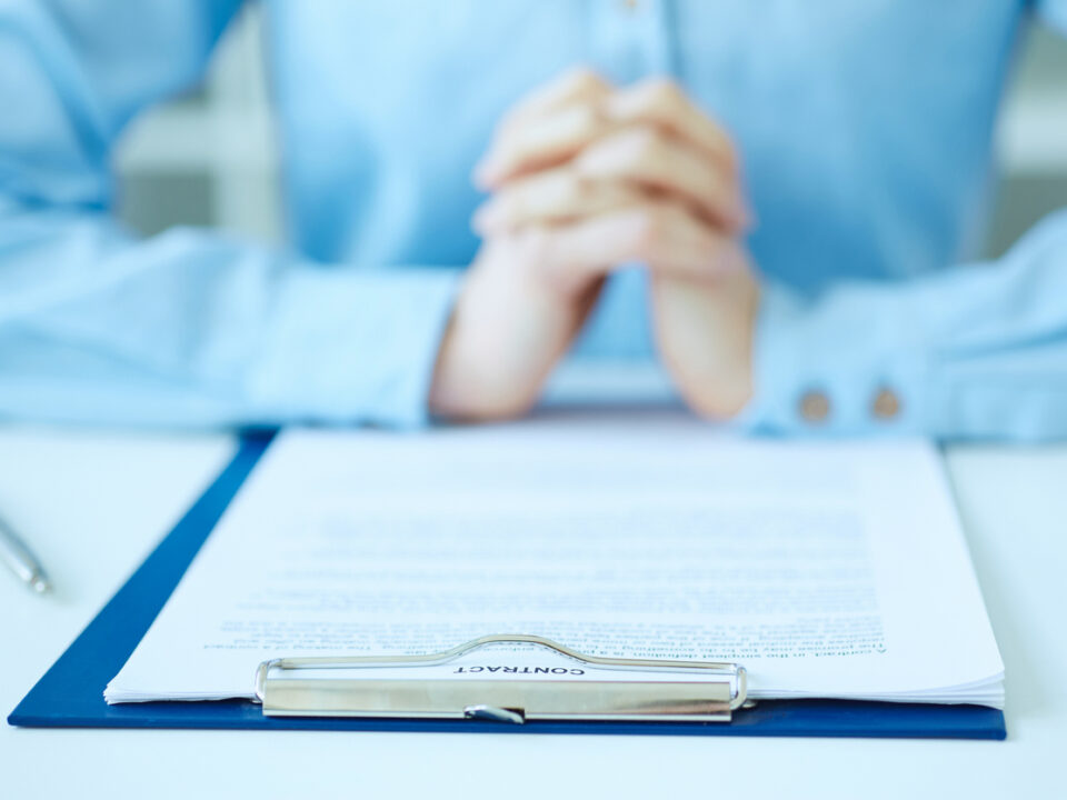 Contract on table
