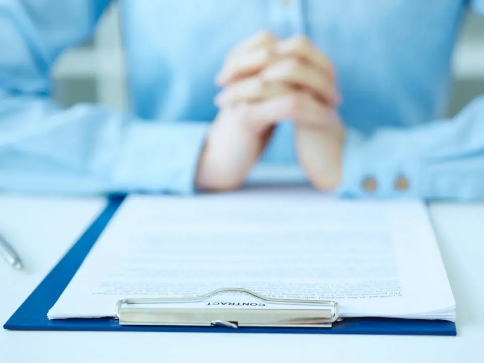 Contract on table