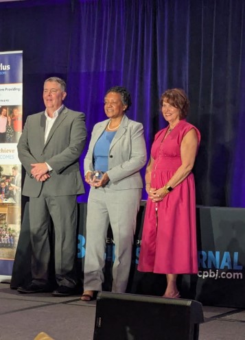 Left to right: Ernie Long, Gladys Brown Dutrieuille and Michele Engle.